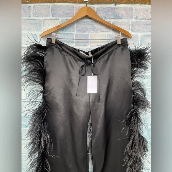 MARQUES' ALMEIDA
Feather-embellished kick-flare satin trousers size 10 - Picture 3 of 16